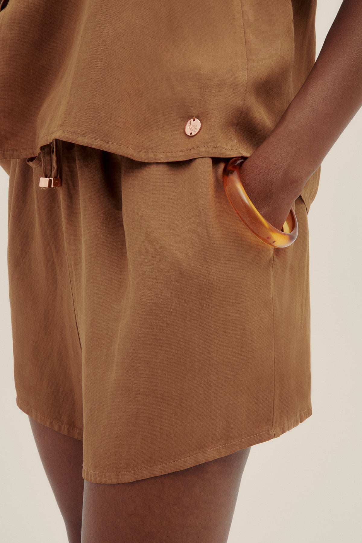 Short Vale Bronce - Polonio Uruguay